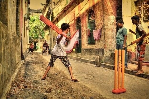 Street tennis-ball cricket in a sub-continent gully